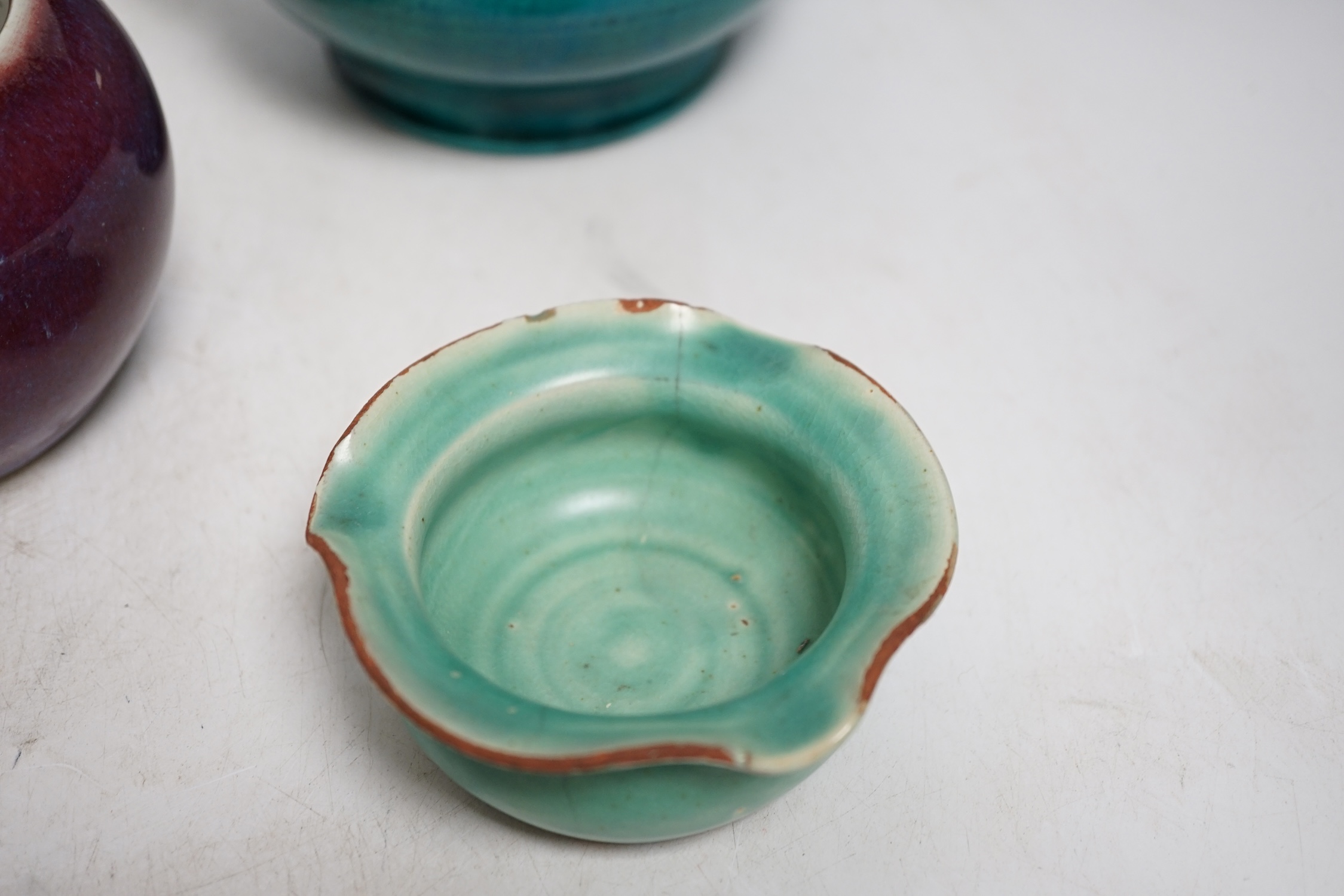 A Chinese Jun type bud vase, a crackle glaze incense burner, and three other items, largest 12cm high. Condition - fair to good